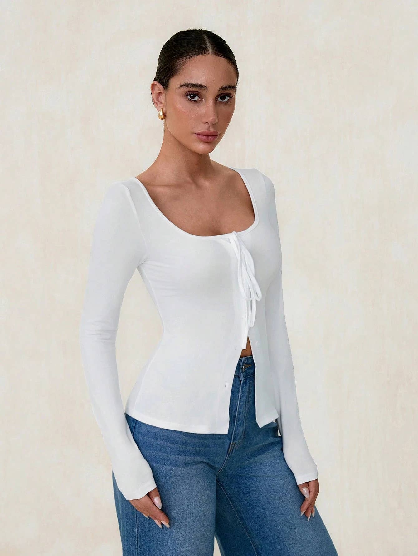Solid-color long-sleeved lace-up fitted top
