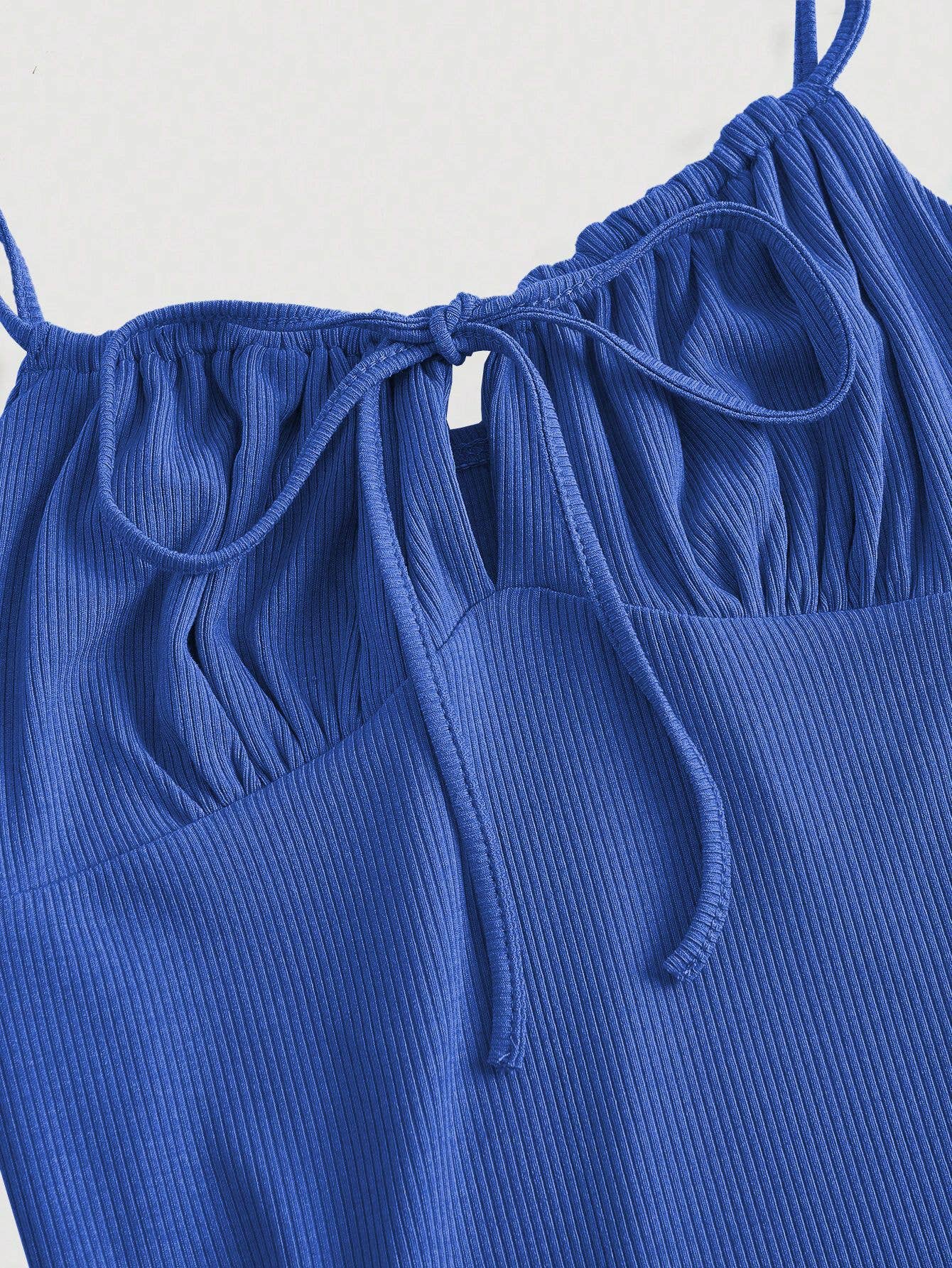 Lace-up, hip-hugging, strappy fishtail dress