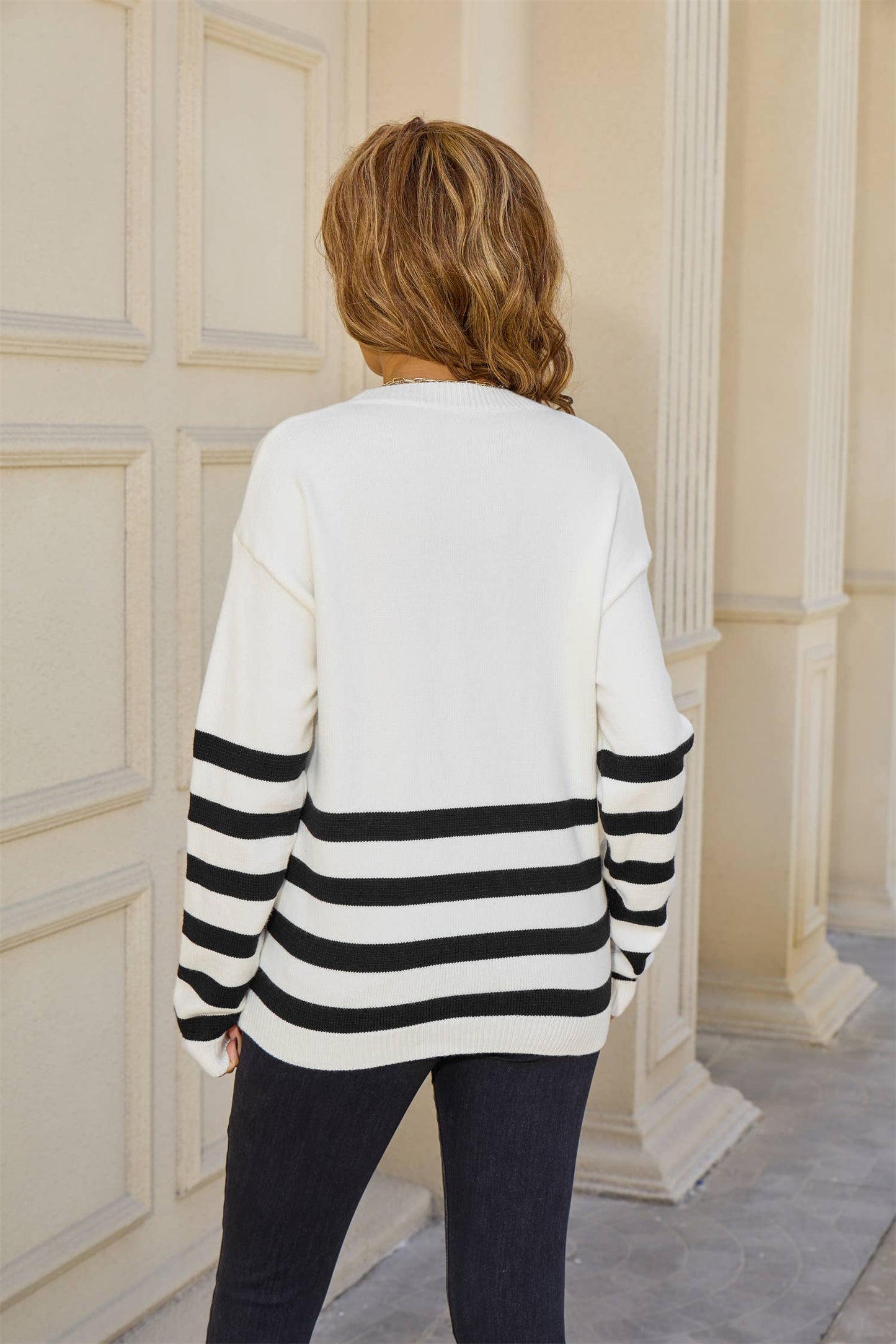 Round-neck, long-sleeved and striped sweater
