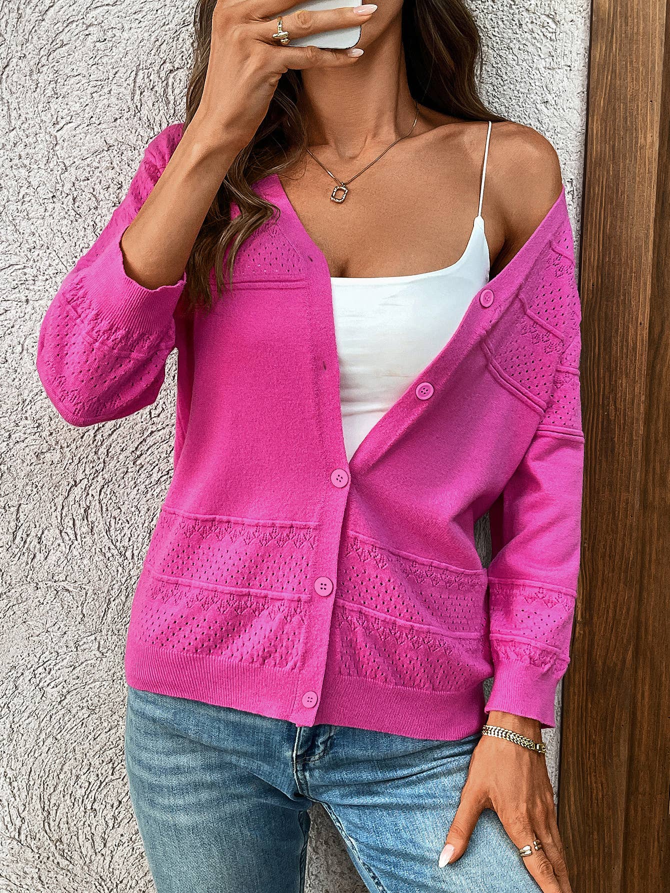 Three-quarter sleeve hollowed-out V-neck cardigan