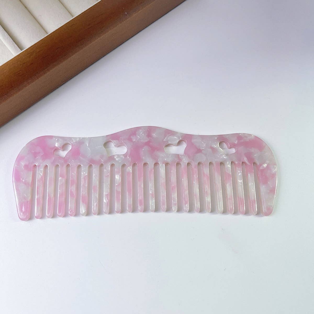 HOLLOW HEART PORTABLE MASSAGE COMB