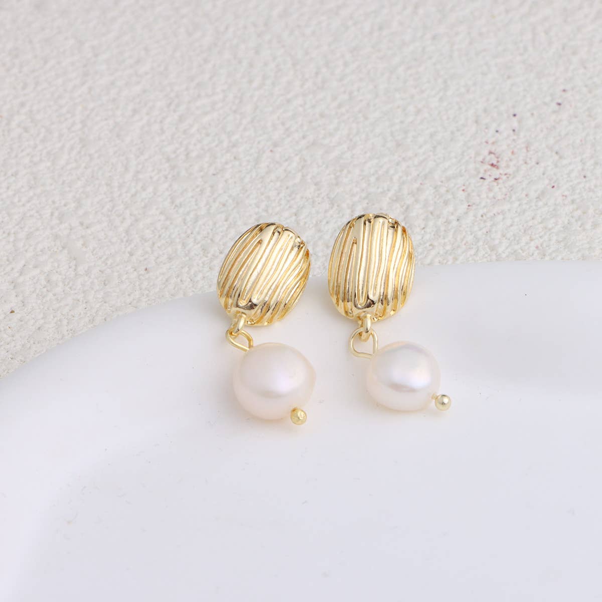 Trendy metal bow freshwater pearl earrings