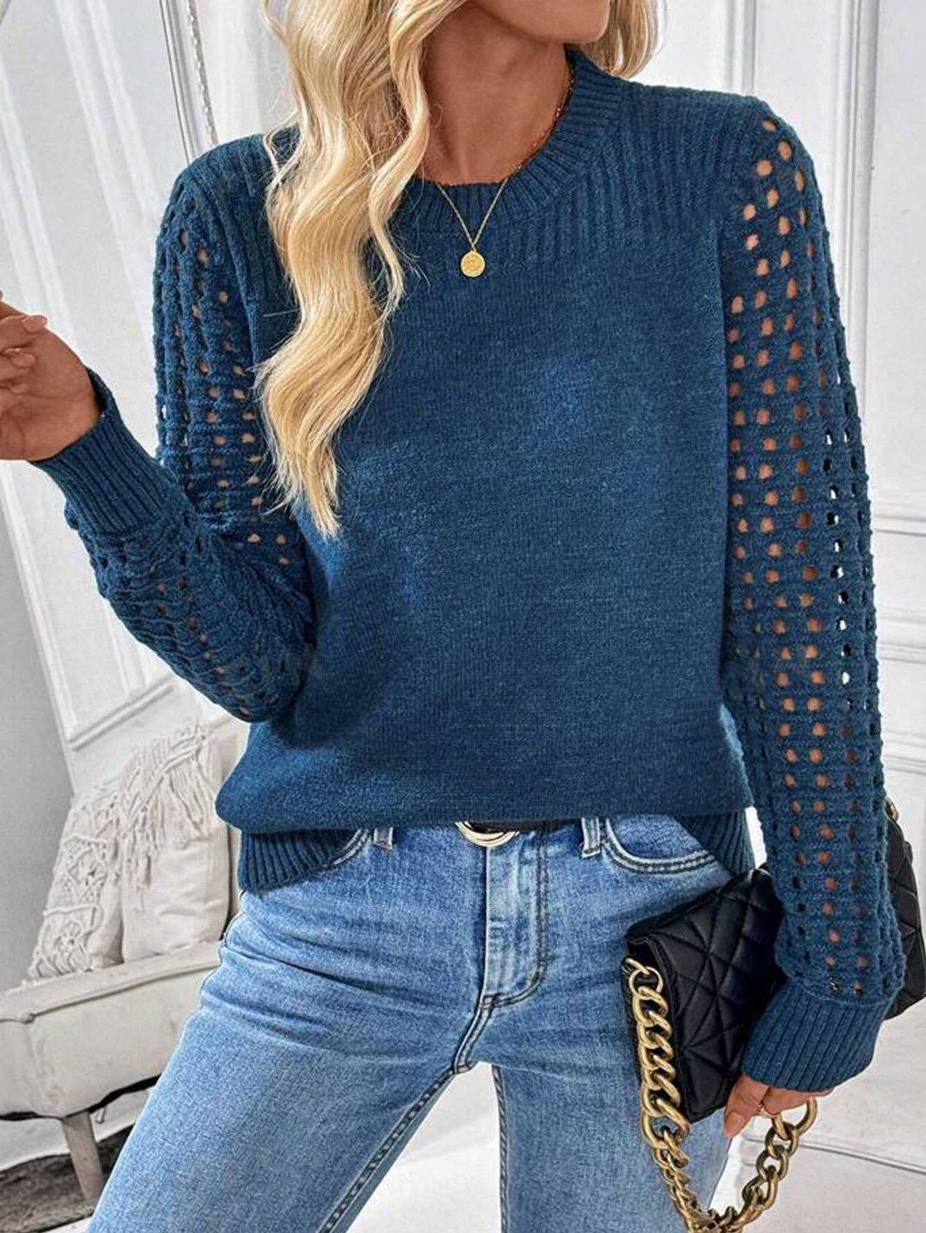Solid-color cut-out round-neck knitted sweater