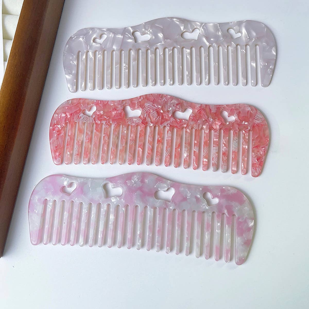 HOLLOW HEART PORTABLE MASSAGE COMB