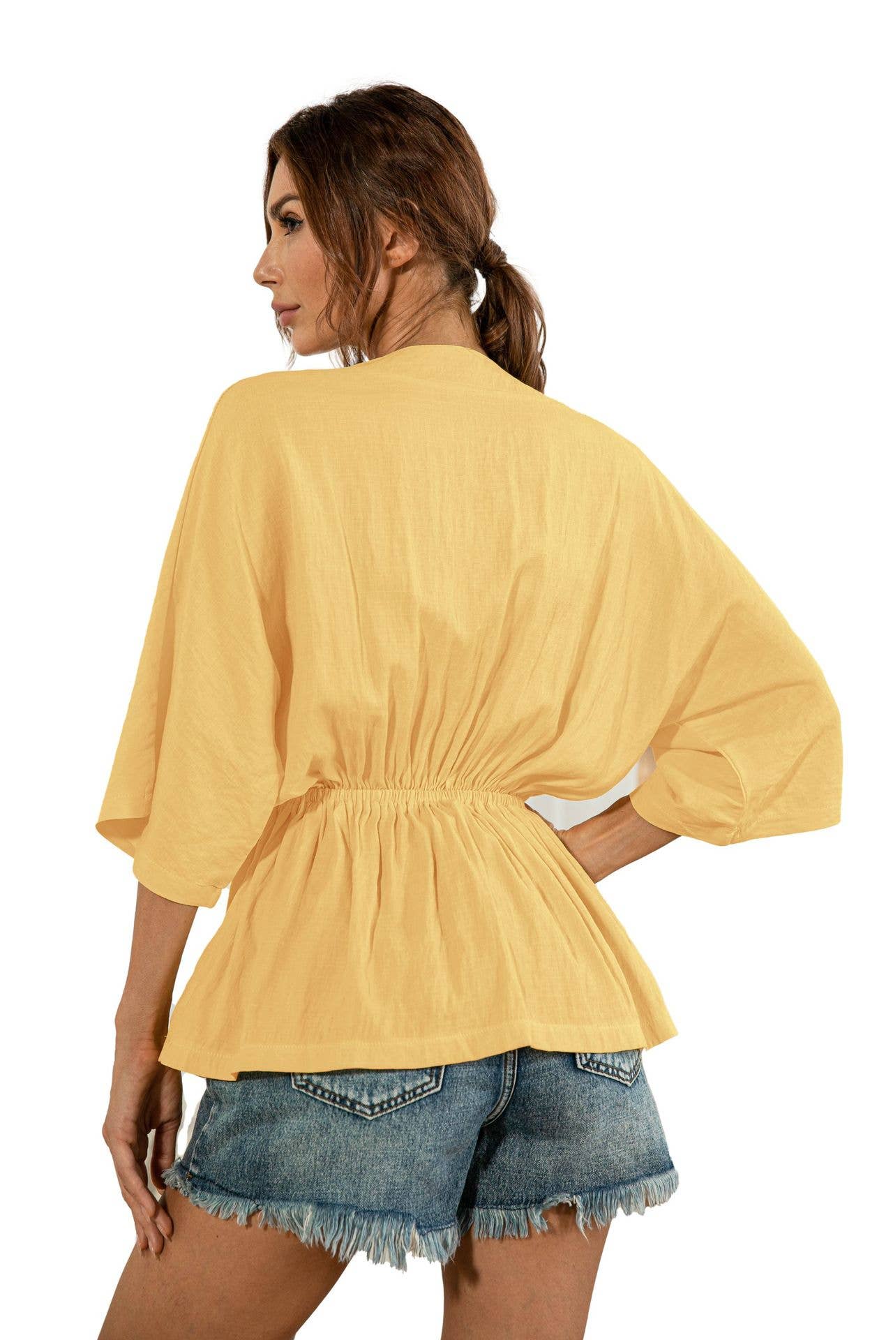 Solid color deep V-neck loose waist blouse