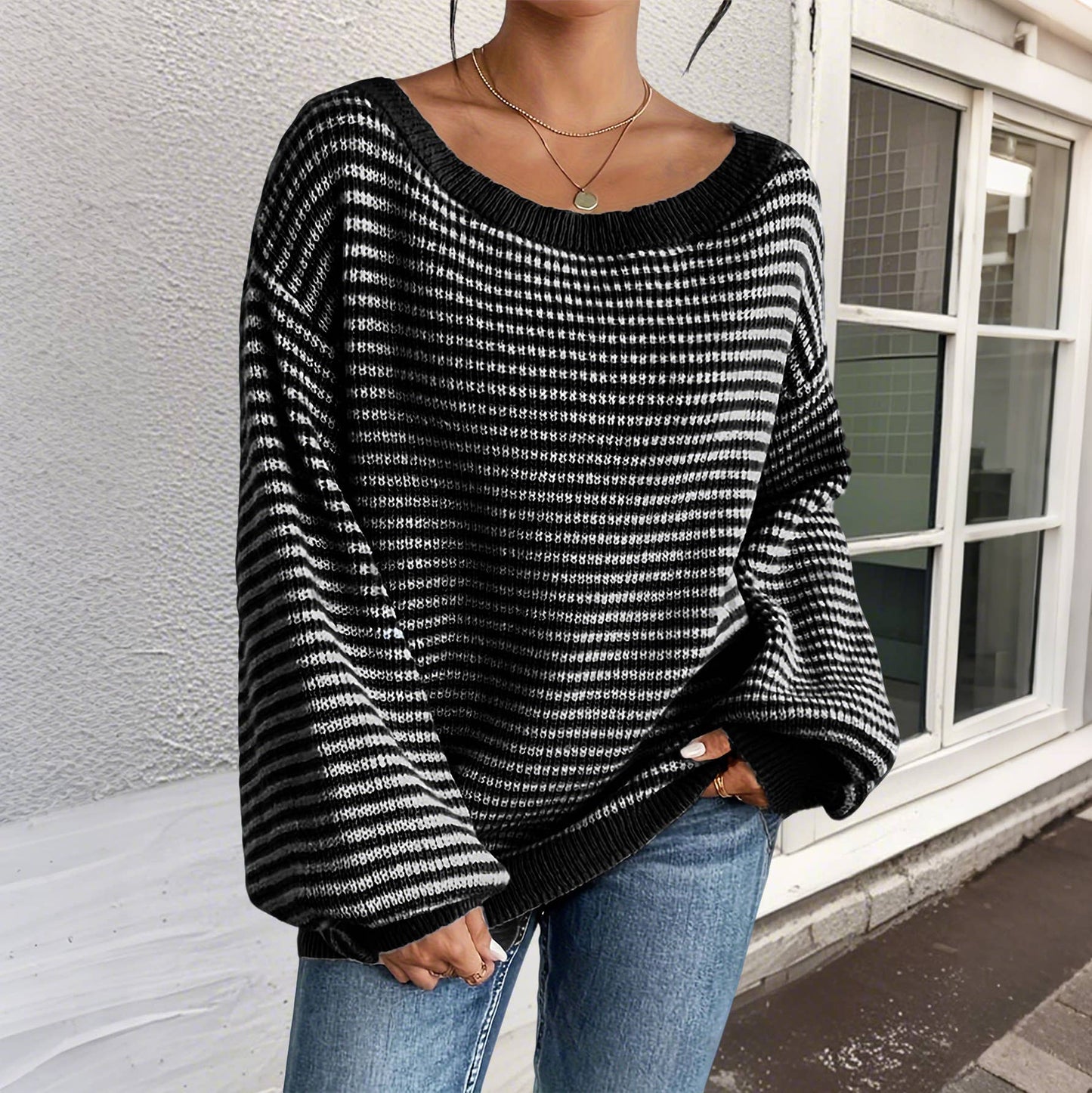 Striped off-the-shoulder sleeve knitted sweater