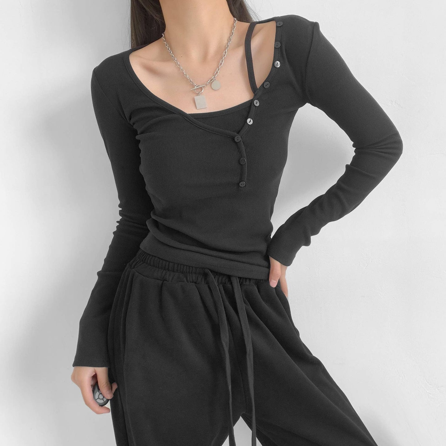 TWO BUTTON-UP LONG-SLEEVED T-SHIRTS