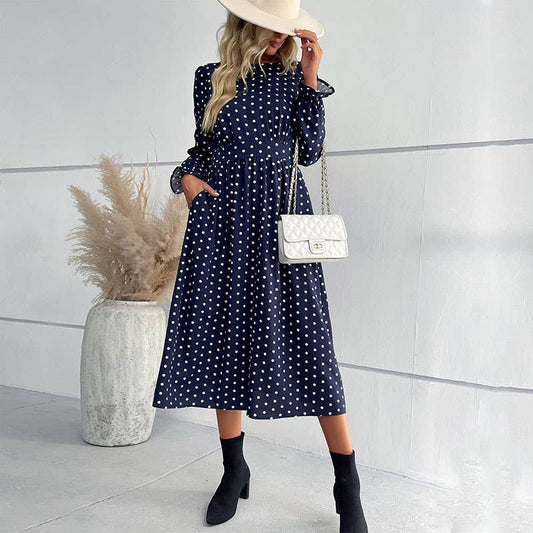 Polka dot dress with round neck and waist