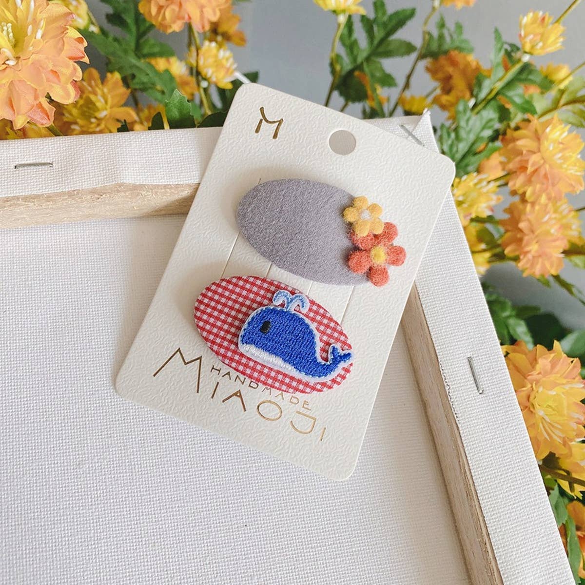 CHILDREN'S OVAL EMBROIDERED PATCH HAIRPIN