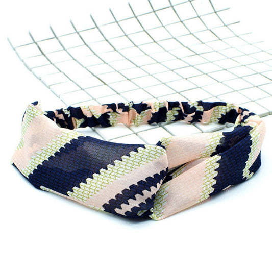 Silk hair band with interlaced patterns