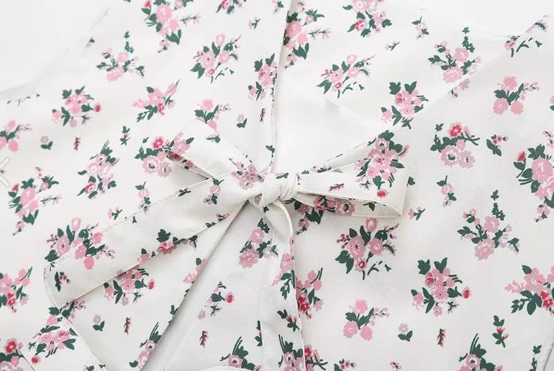 SHORT FLORAL PRINT STRAP VEST