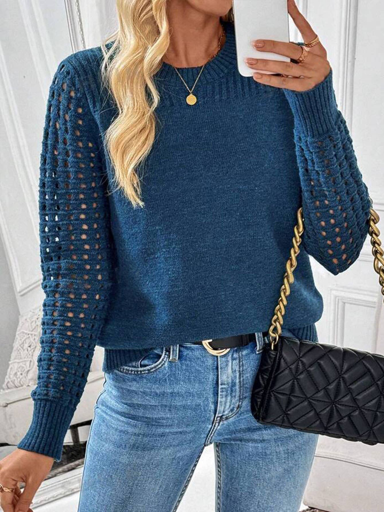 Solid-color cut-out round-neck knitted sweater