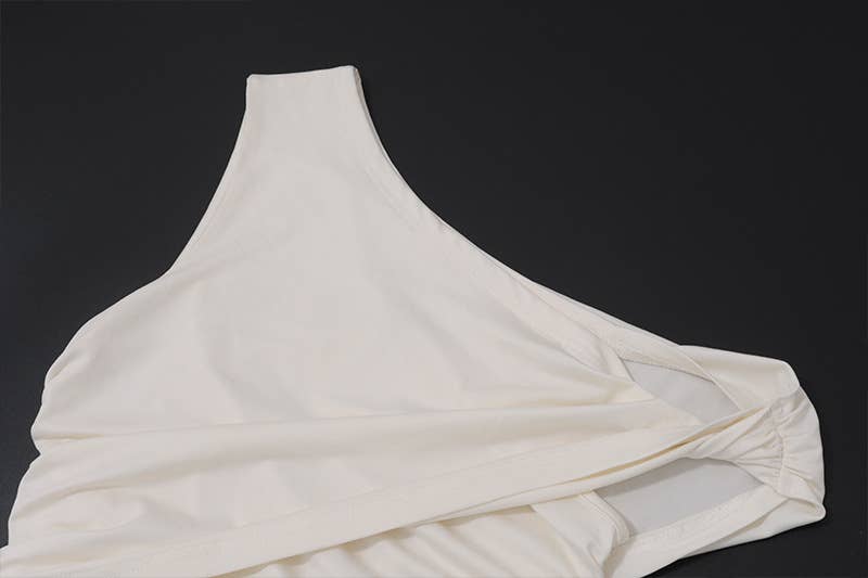 Irregular short crop top with a slanted collar