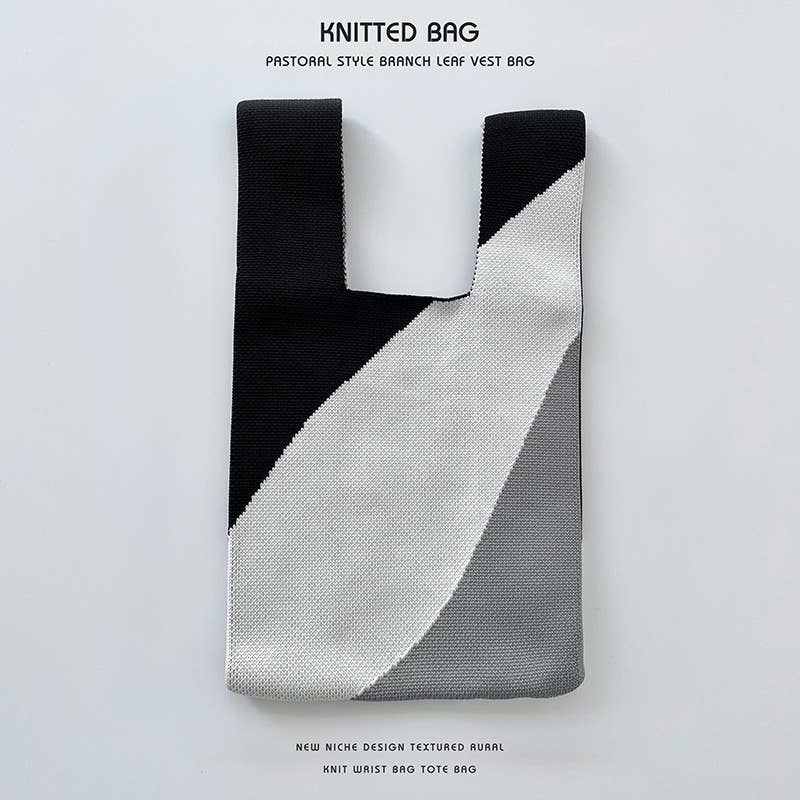 Heart-shaped color-blocked knitted handbag