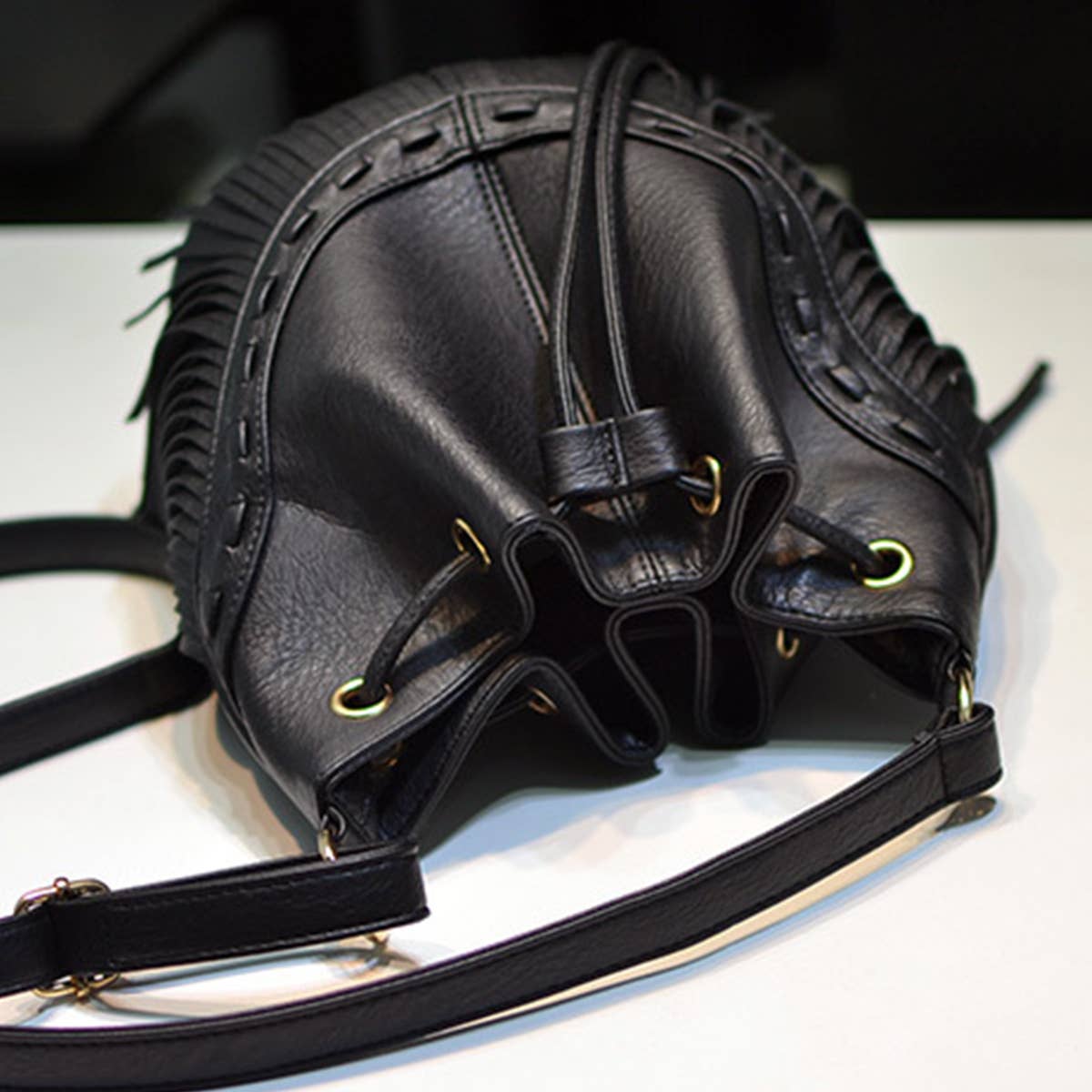 WOMEN LEATHER TASSEL BUCKET BAG_CWAB0791