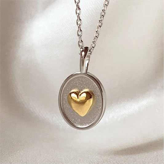 Women's two-tone heart oval pendant necklace