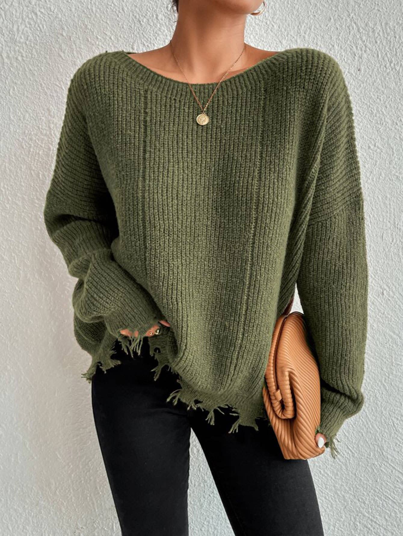 Laid-back style distressed frayed sweater