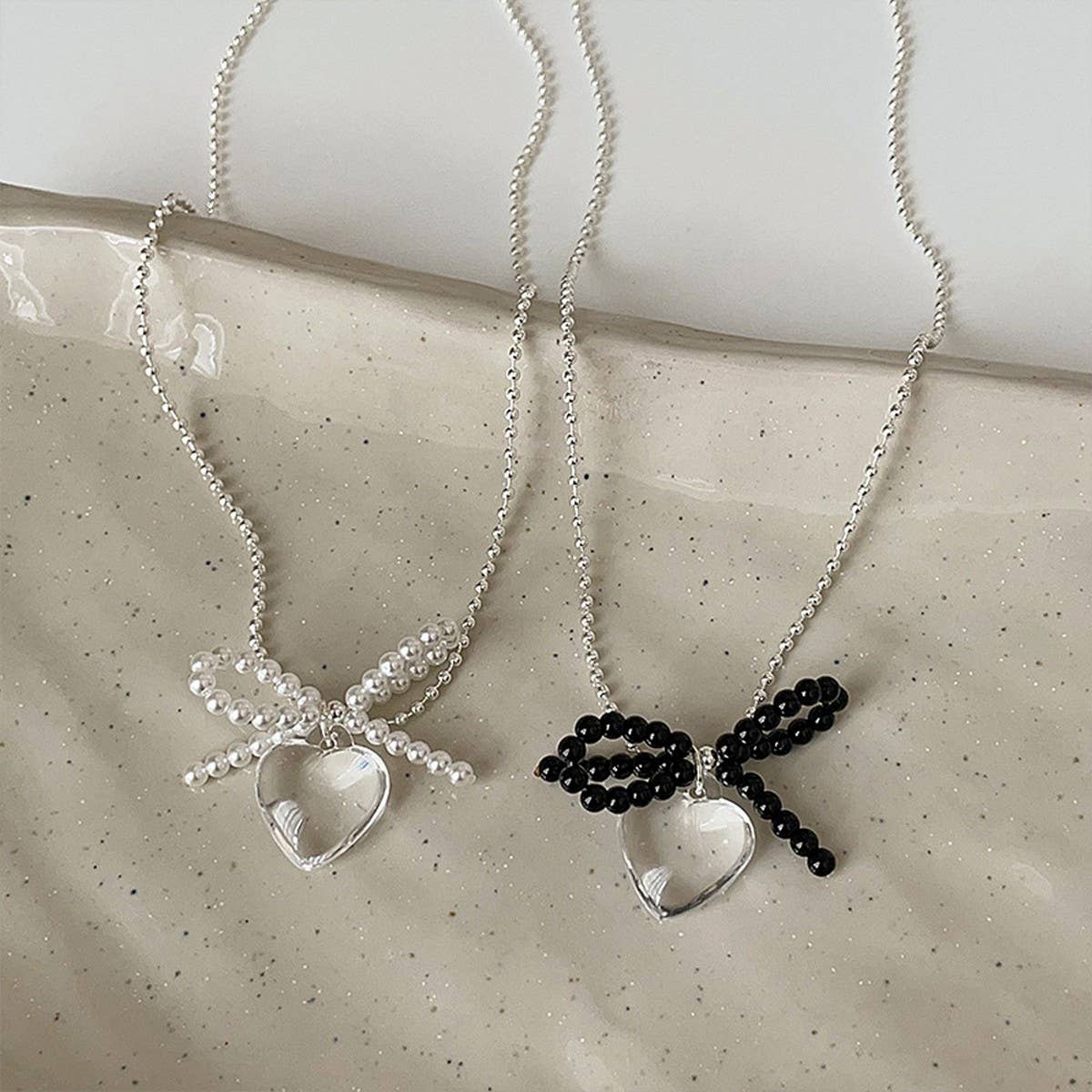 FASHION TRANSPARENT HEART PENDANT BOW NECKLACE_CWAJE3073