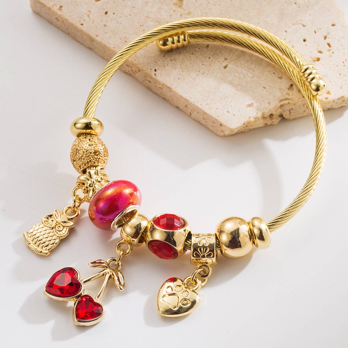 Gold Beaded Bracelet with Crystal Charms