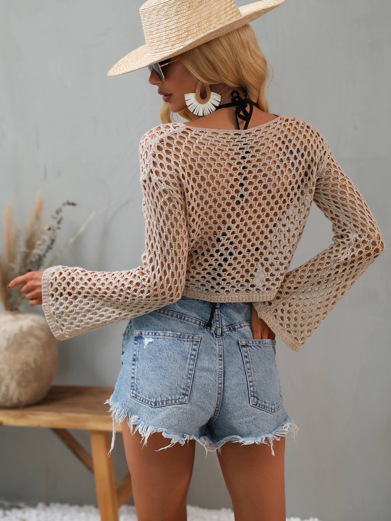 Knitted Bell Sleeve Hollow Round Neck Sweater