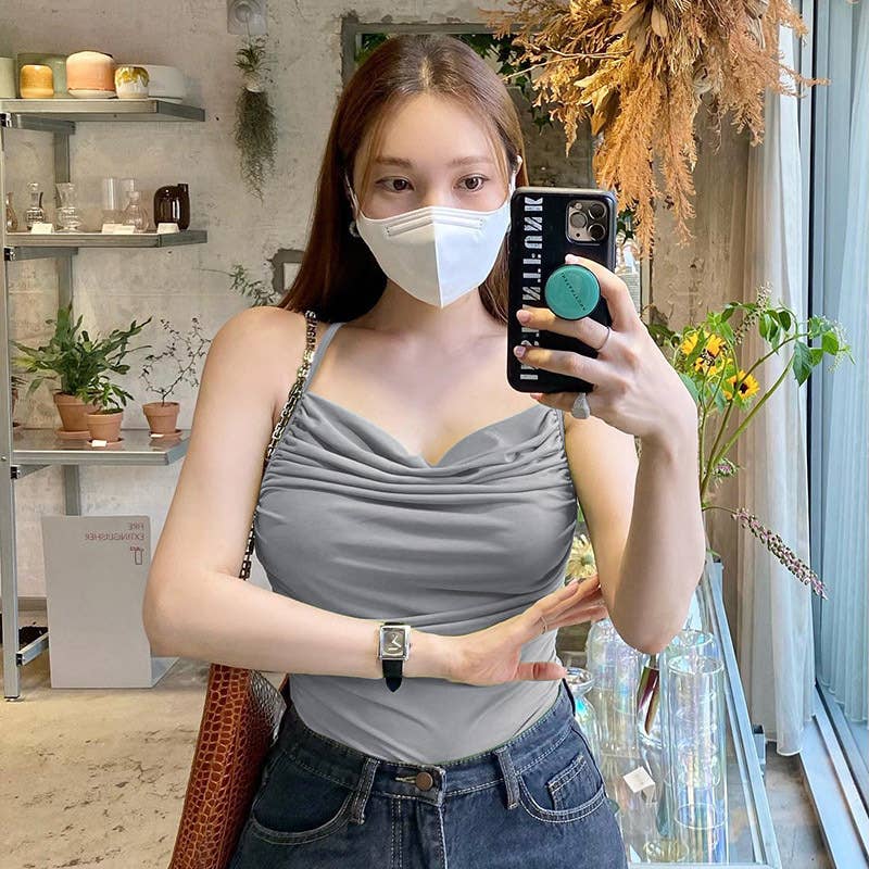 Slimming solid-color halter strap with a neckline