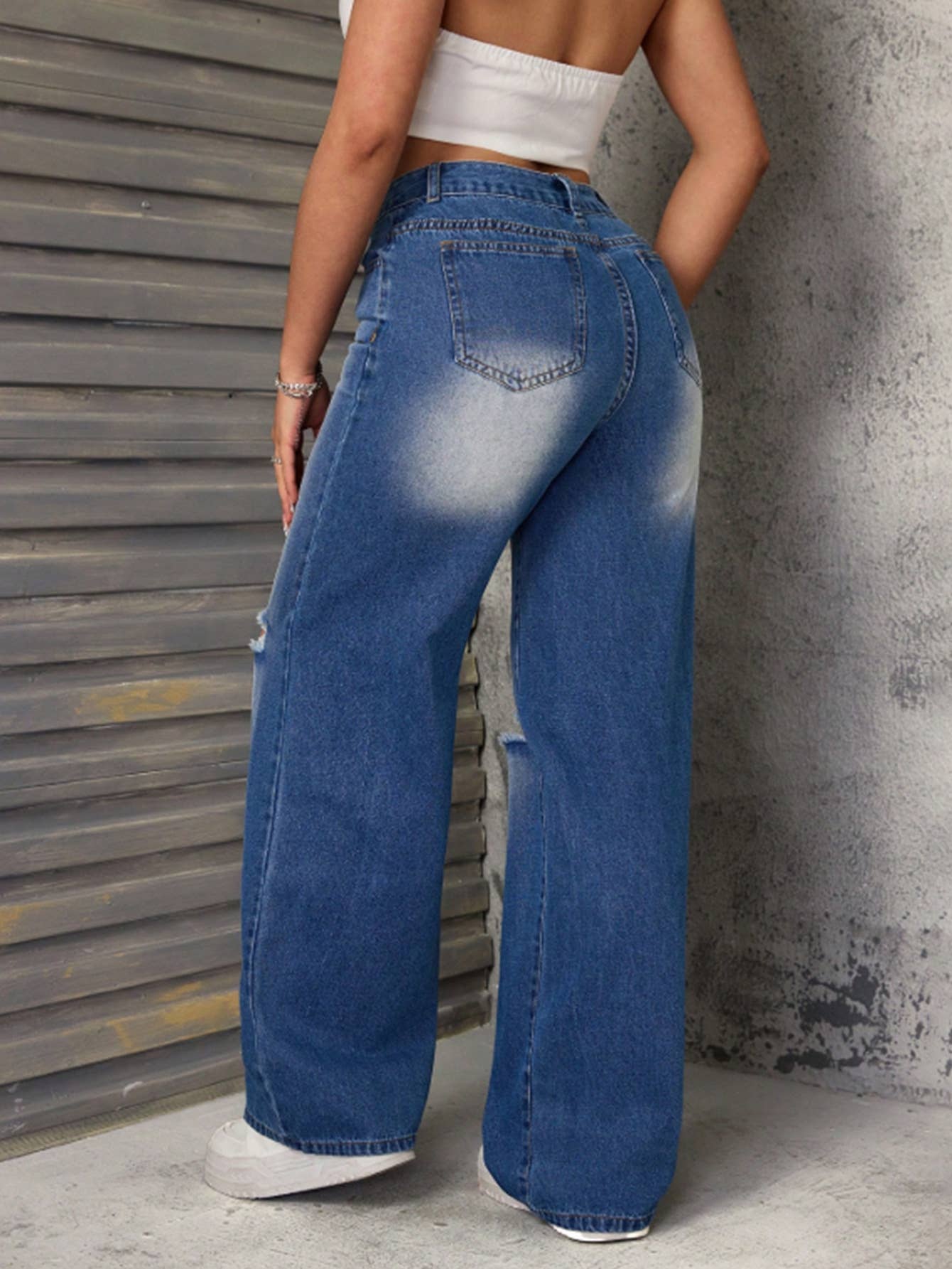 Ripped high-waisted straight-leg denim trousers