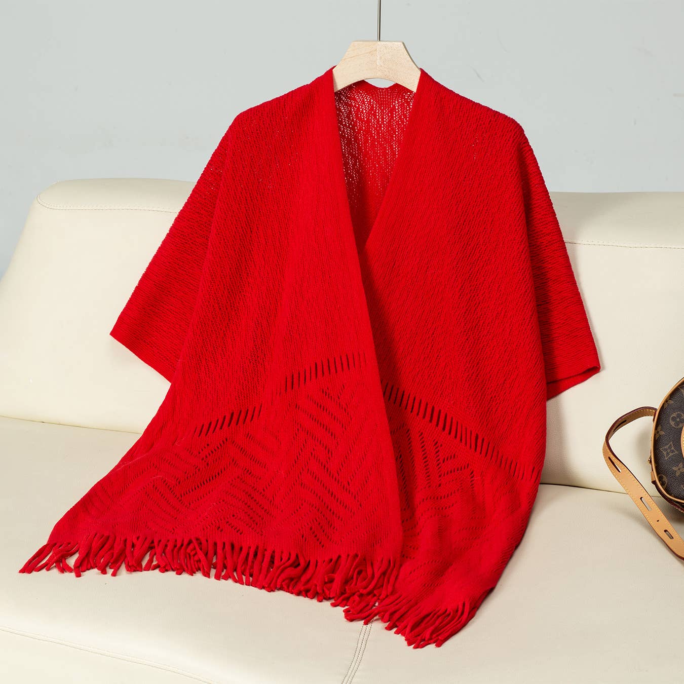 Solid colour hollow knit tassel cape cape