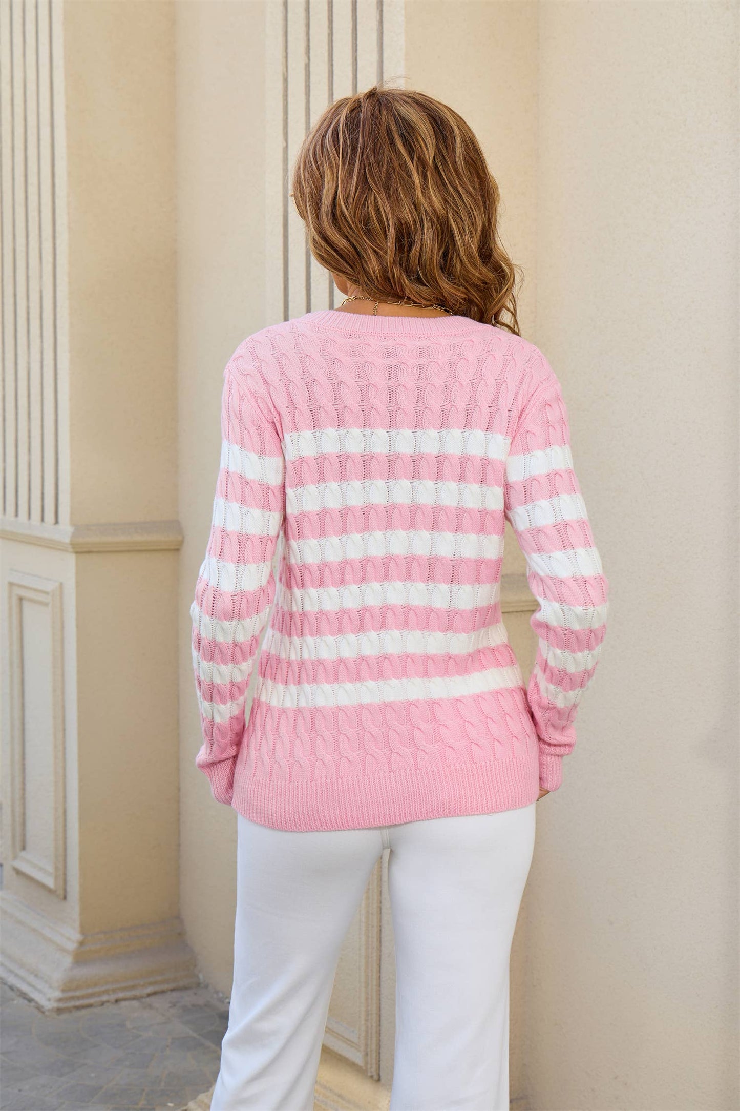 Twisted and color-blocked round-neck sweater