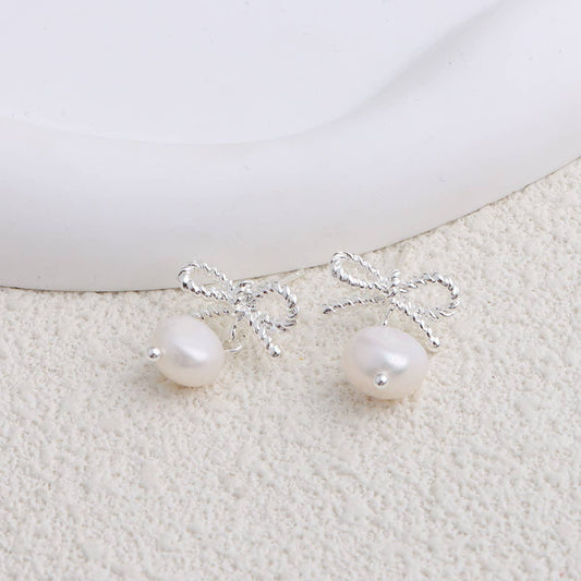 Trendy metal bow freshwater pearl earrings