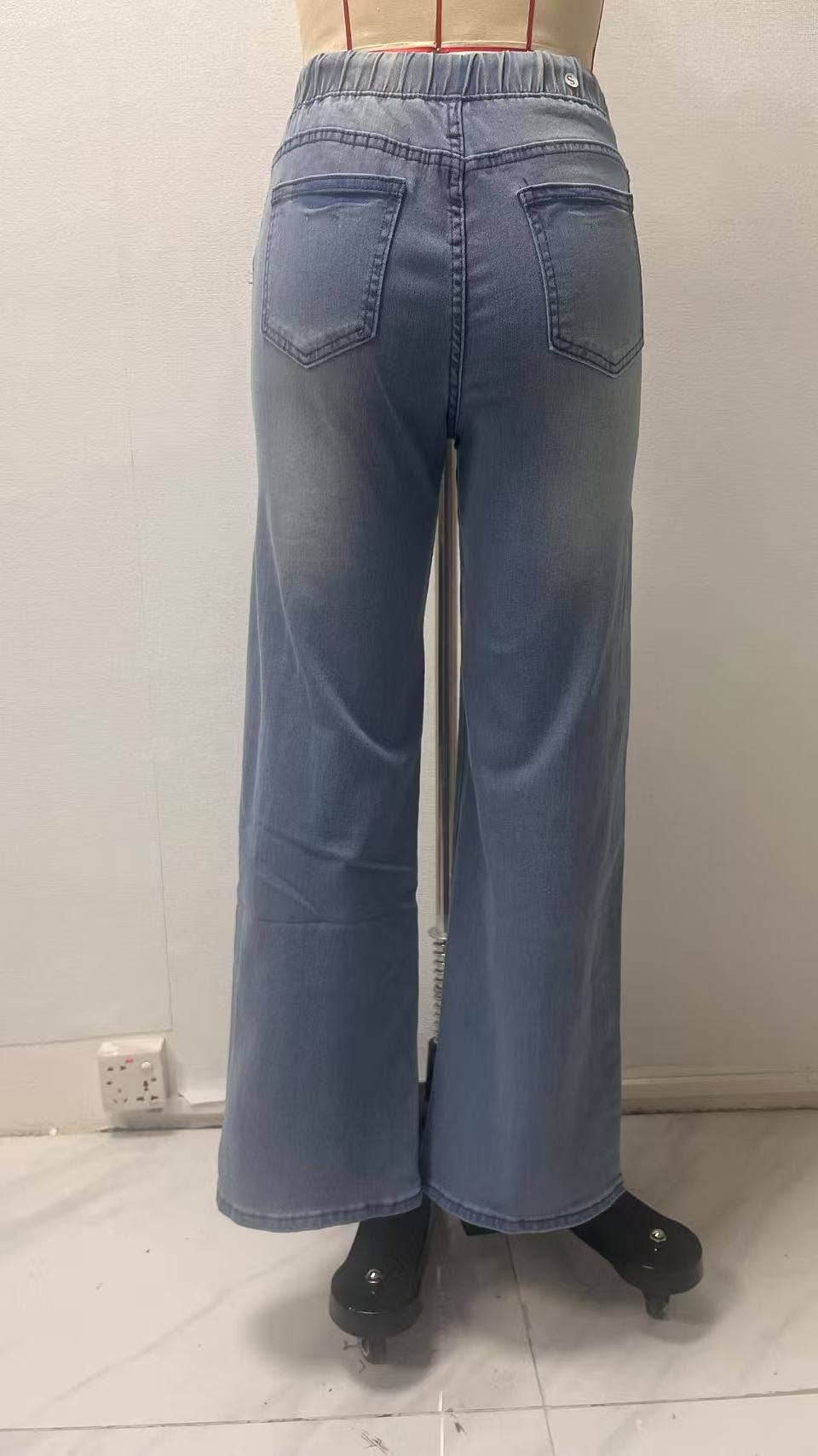 Lace-up waist-cinching straight-leg trousers