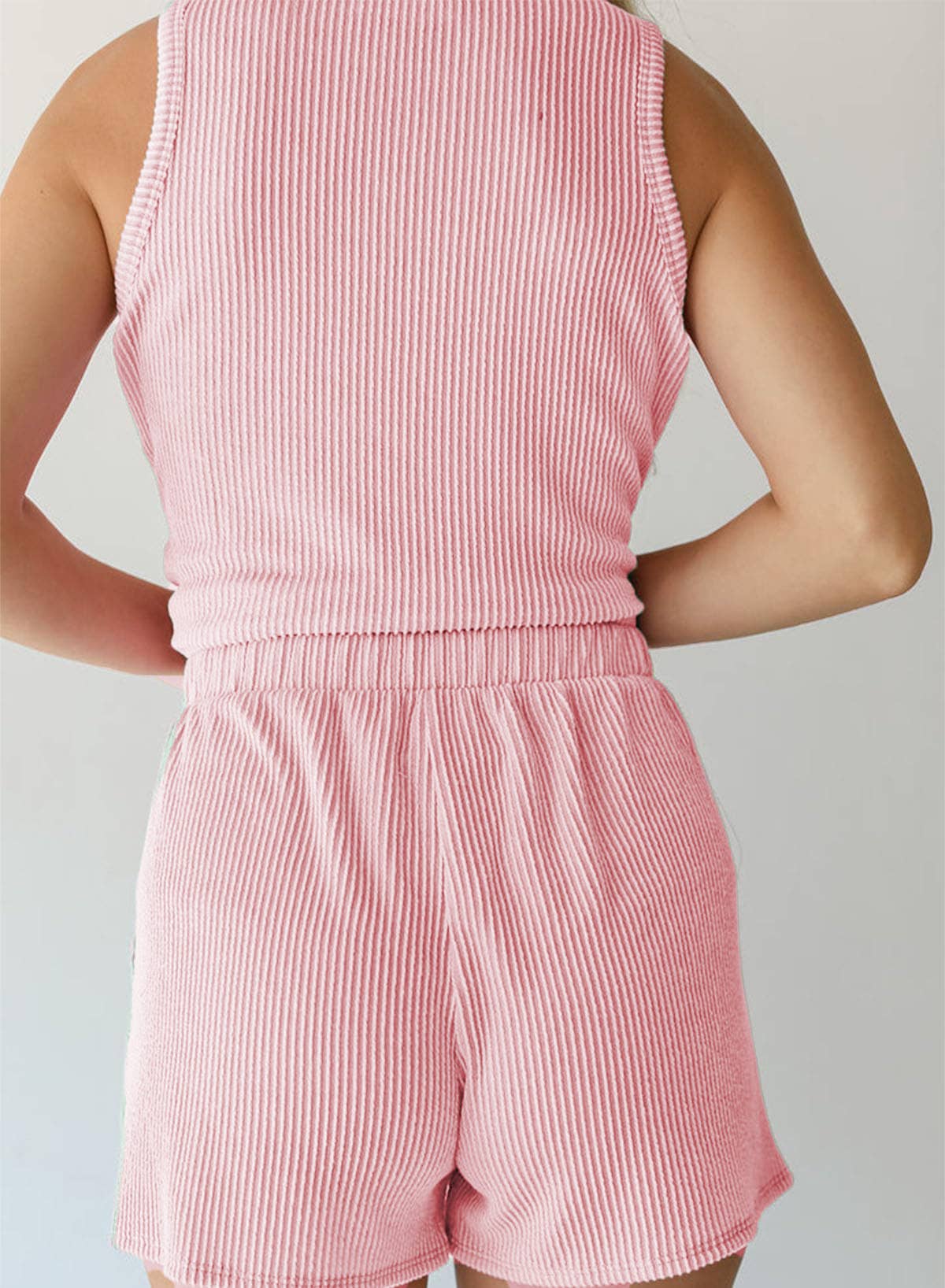 Twisted sleeveless vest, shorts and striped suit