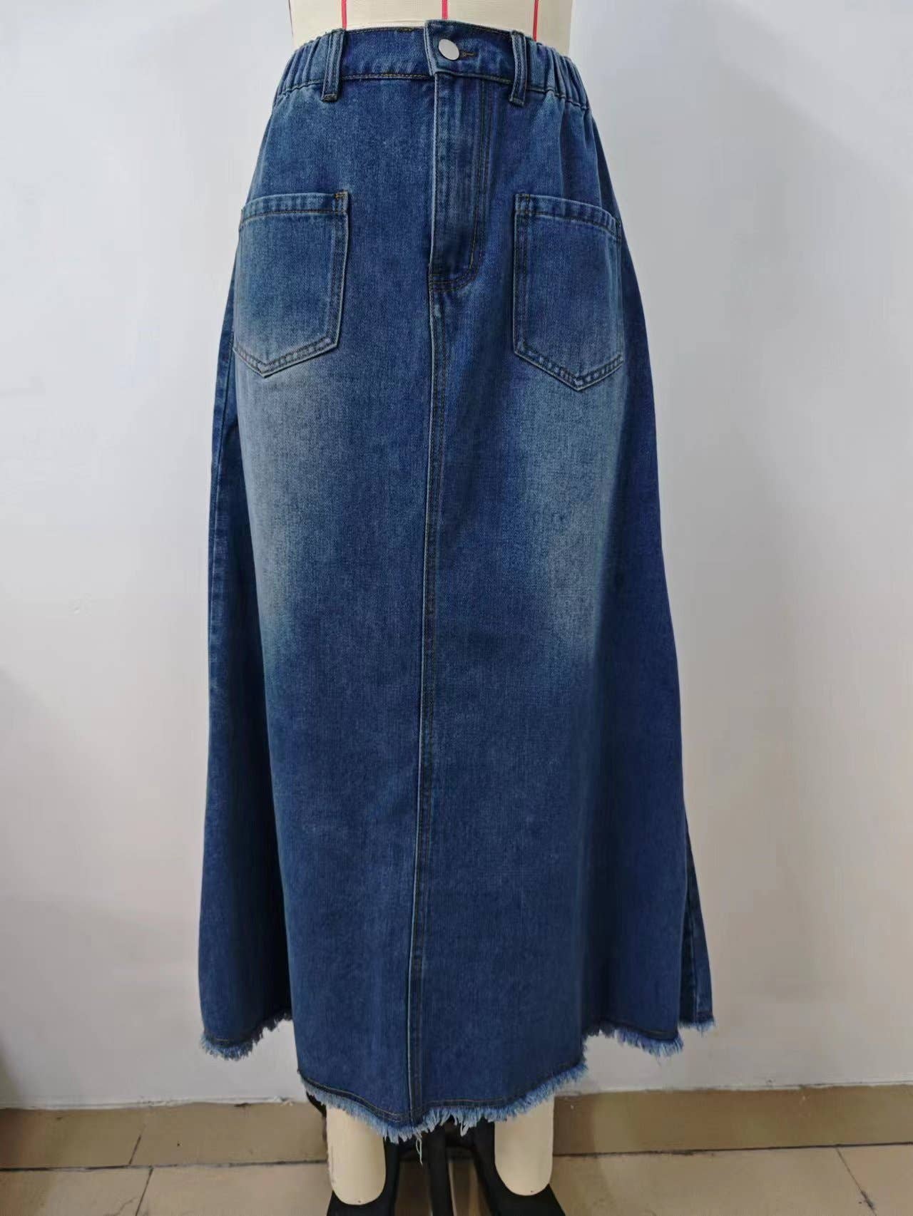 WASHED DENIM SKIRT WITH RAW HEM MIDI