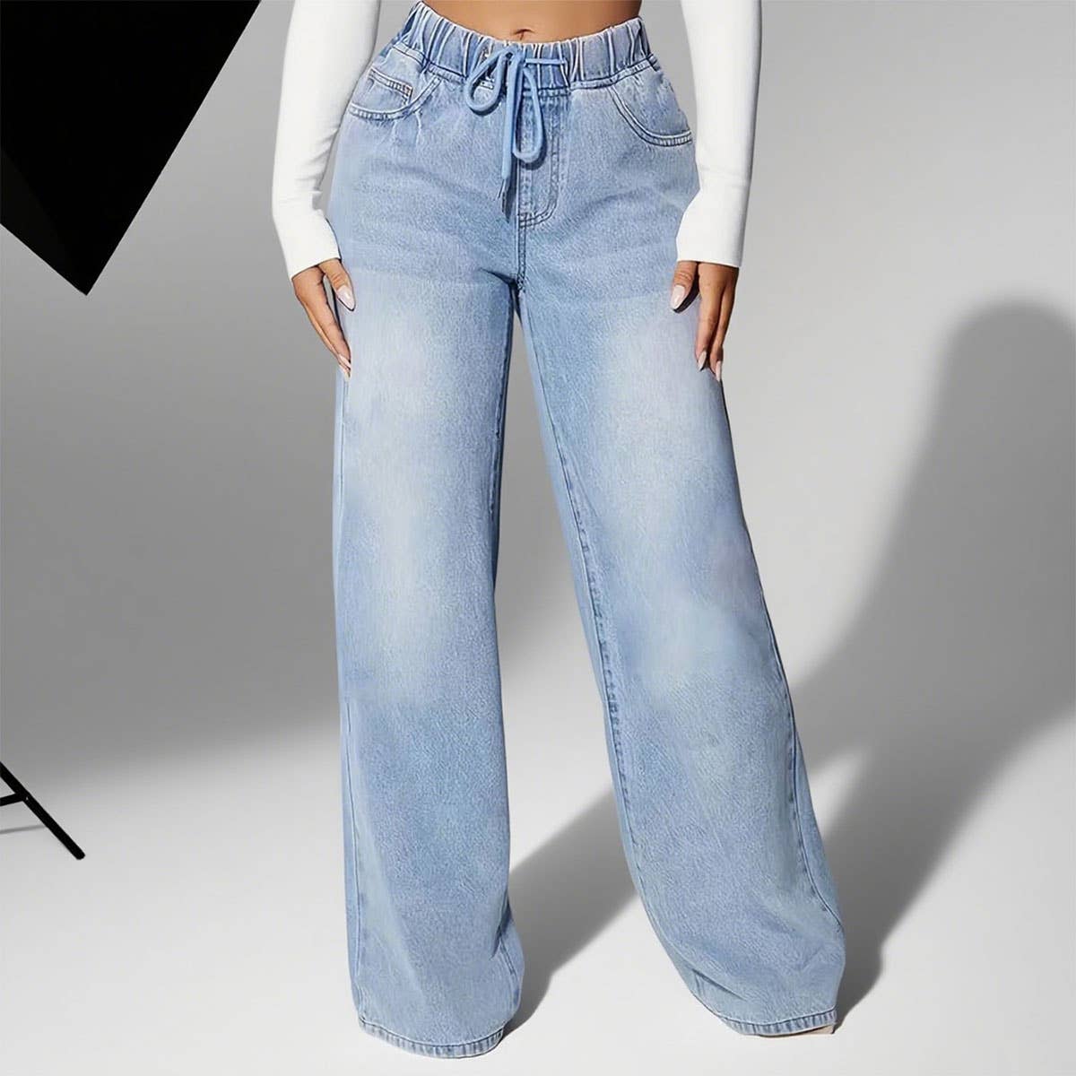 Lace-up waist-cinching straight-leg trousers