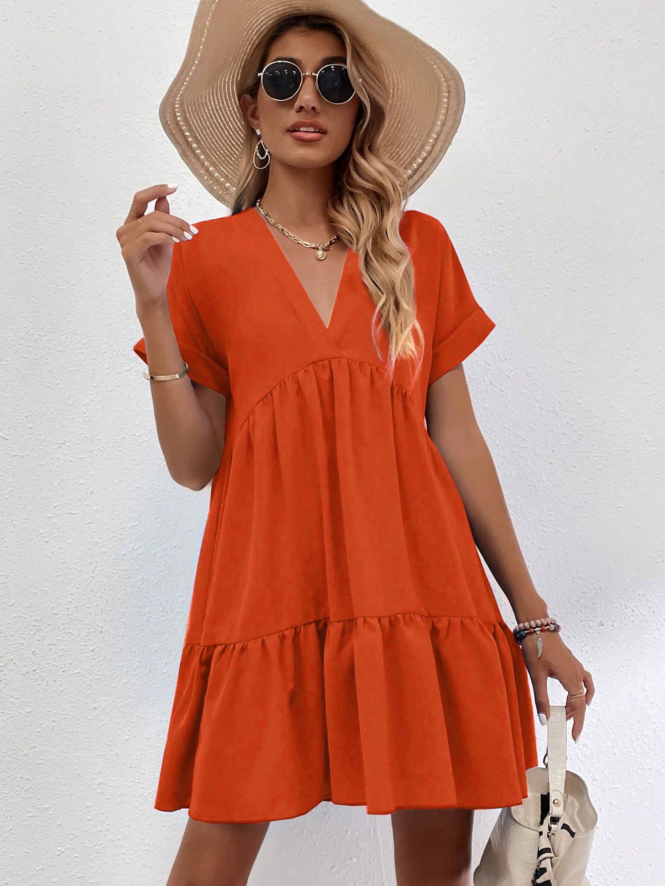 A casual, loose V-neck, large-hem short dress