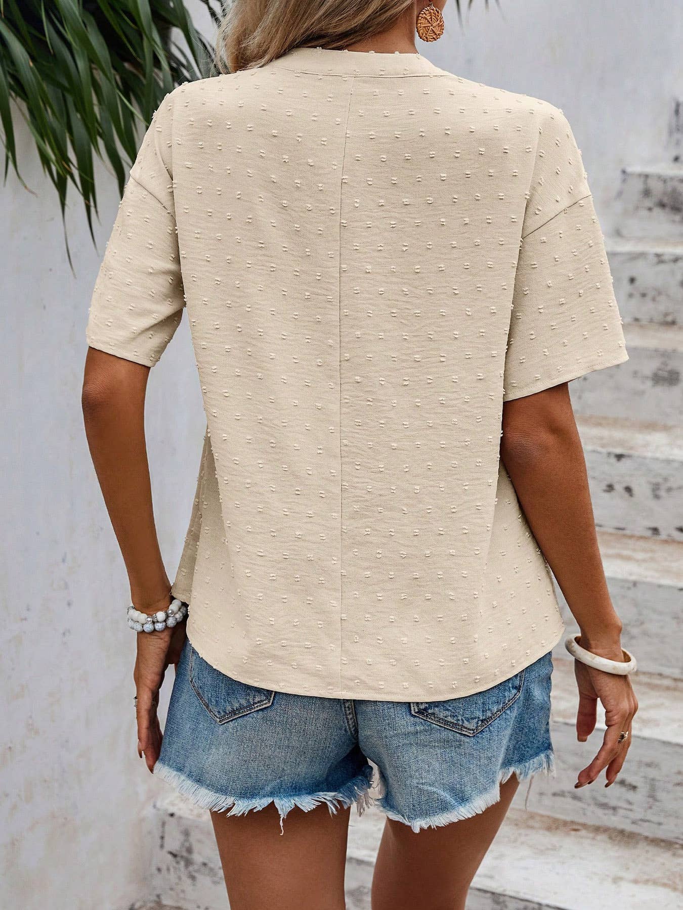 SWISS POLKA DOT PLEATED TOP WITH A CUT NECK