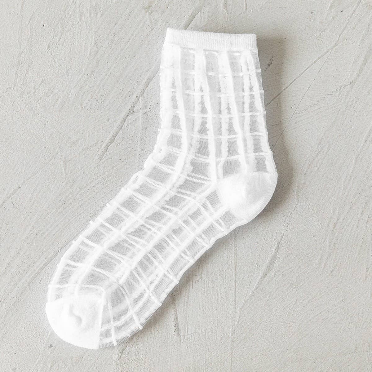 BLACK AND WHITE JACQUARD TRANSPARENT MID-TUBE SOCKS_CWMS0414
