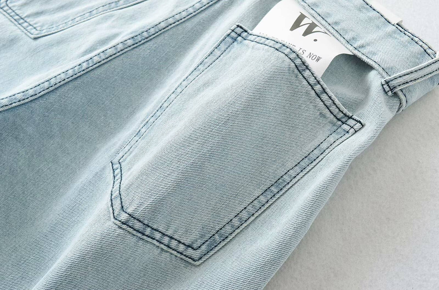 High street girls pair wide-leg jeans with belts