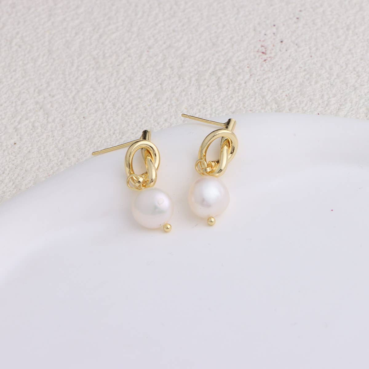 Trendy metal bow freshwater pearl earrings