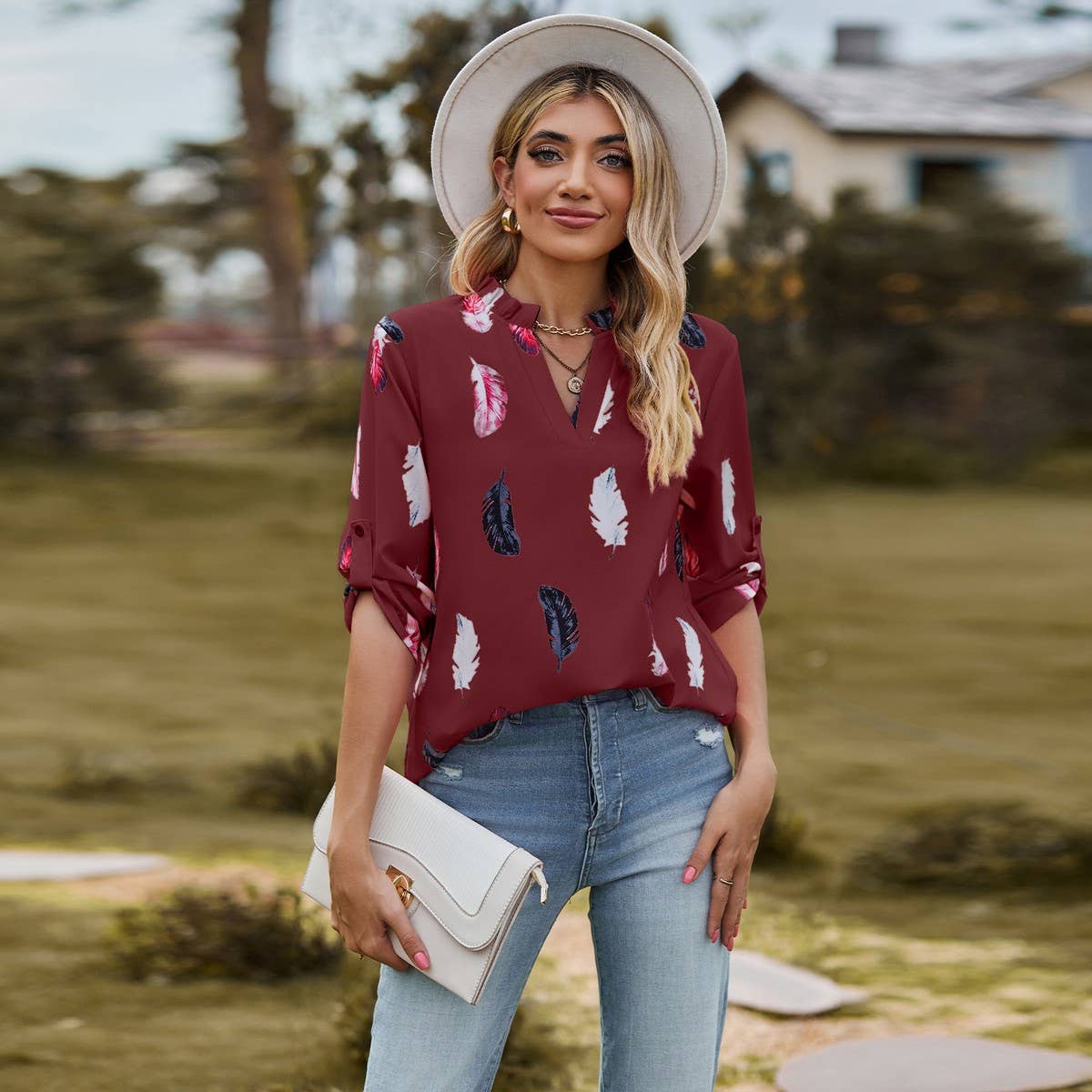 V-neck feather print seven-quarter sleeve shirt