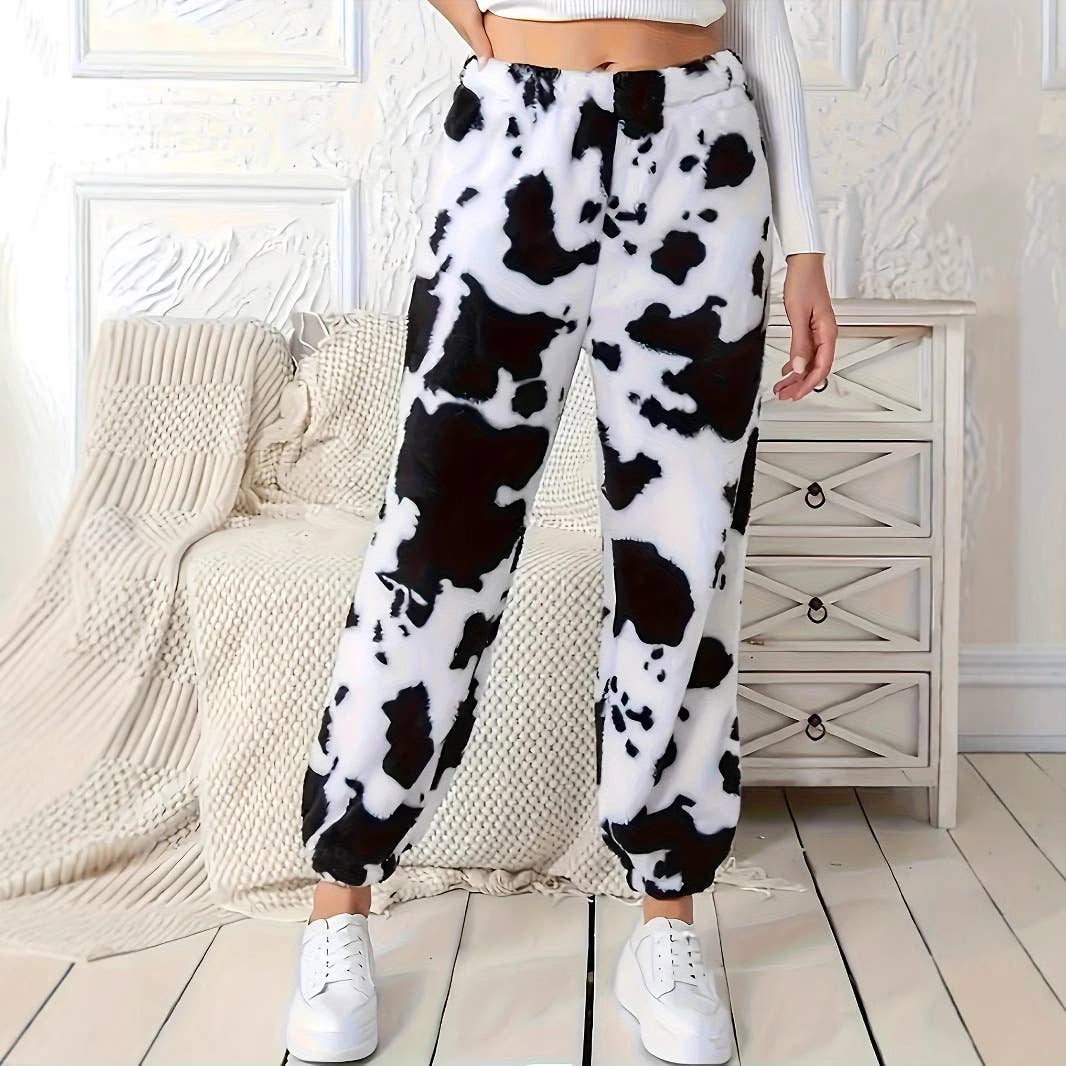 Loose and casual plush trousers with cow prints