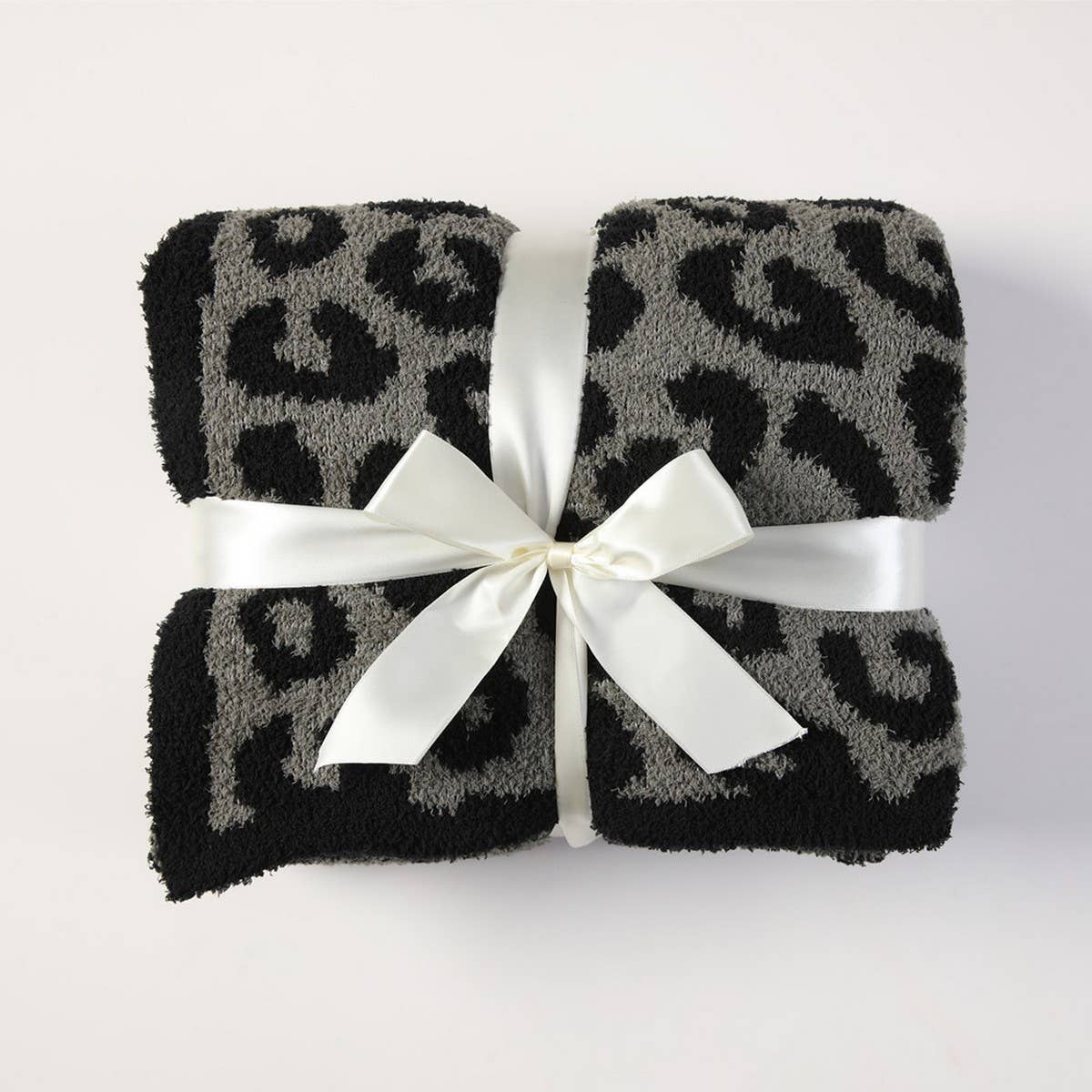 KNITTED LEOPARD PRINT LIGHTWEIGHT SOFA BLANKET