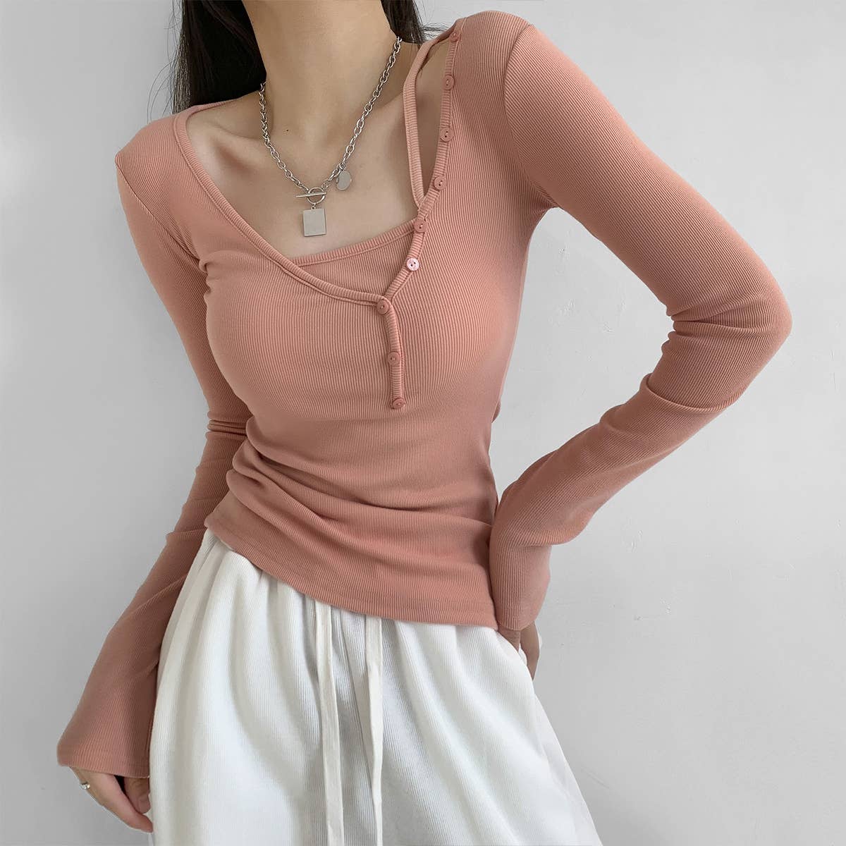 TWO BUTTON-UP LONG-SLEEVED T-SHIRTS