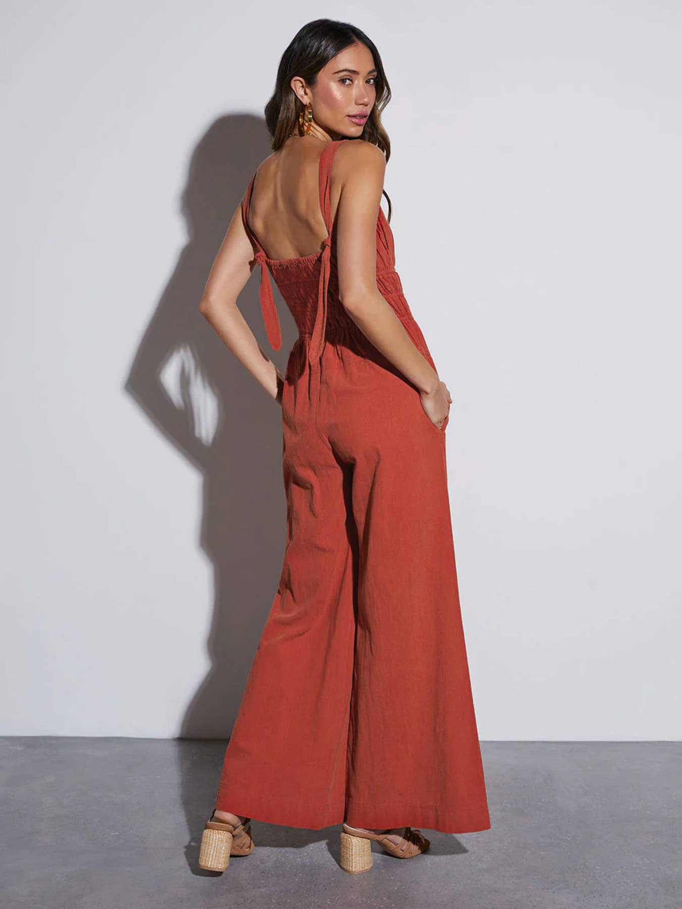 Solid color thin straps baggy flared jumpsuit