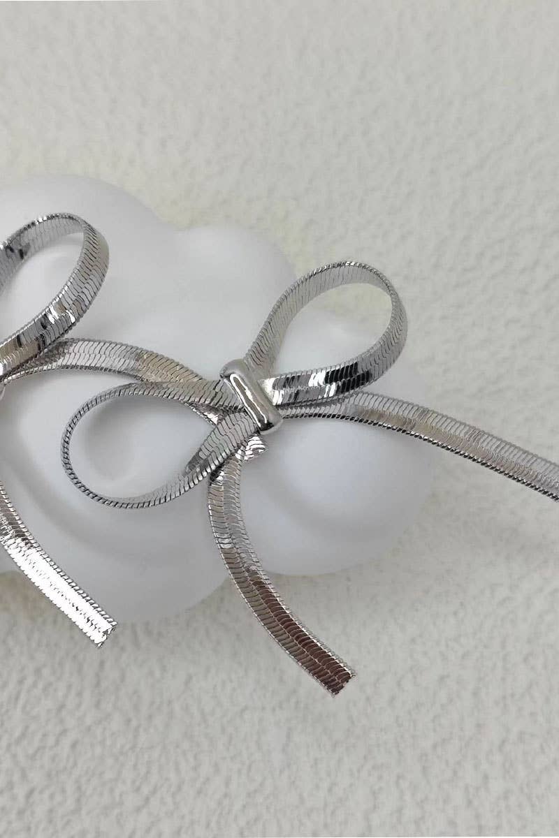 CWAJE1209_THE BOW IS STUD 18K GOLD PLATED EARRINGS