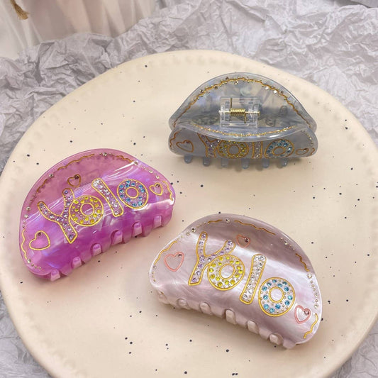 HAIR CLAW CLIP WITH YOLO LETTERS AND RHINESTONES