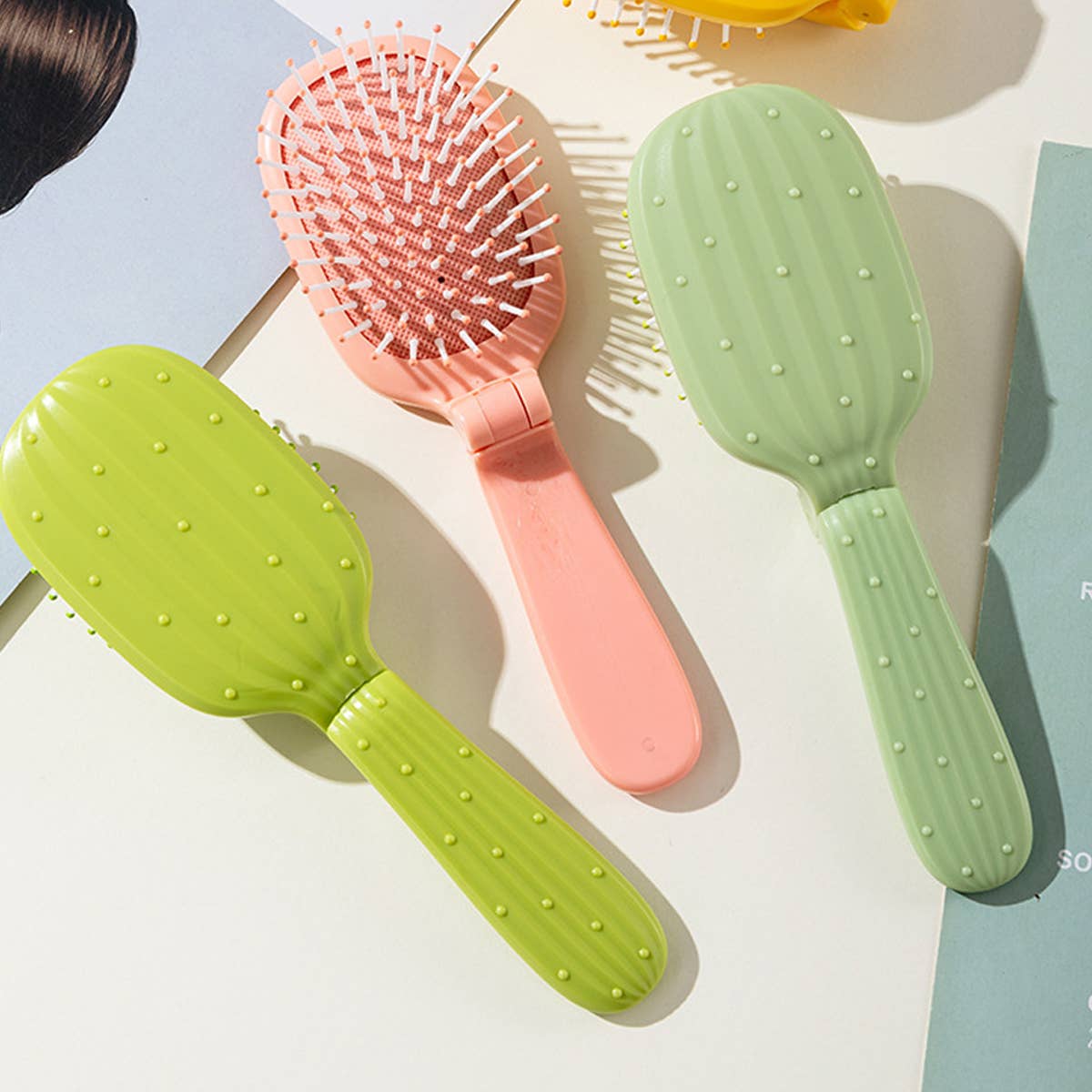 NEW CACTUS FOLDING AIR BAG COMB