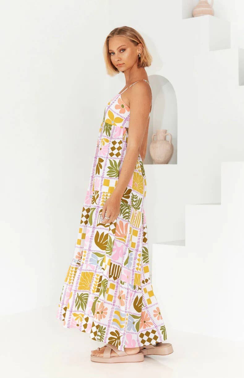Printed and distinctive back-cut halter dress