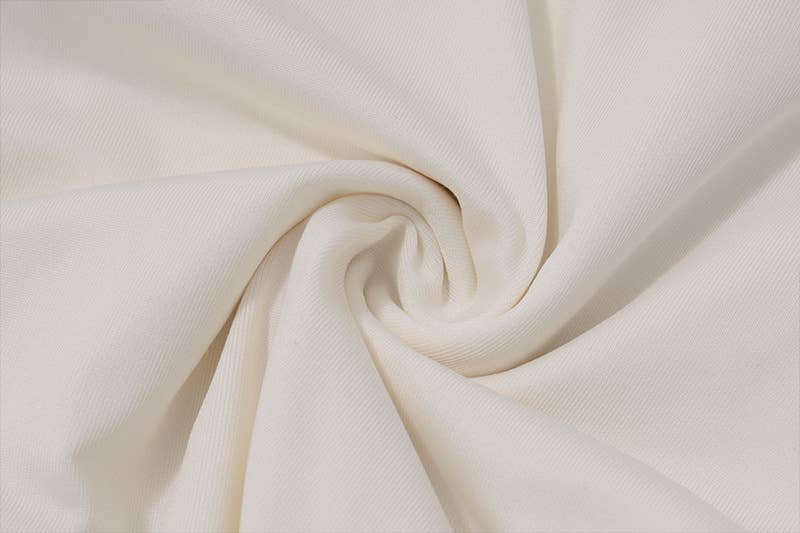 Irregular short crop top with a slanted collar