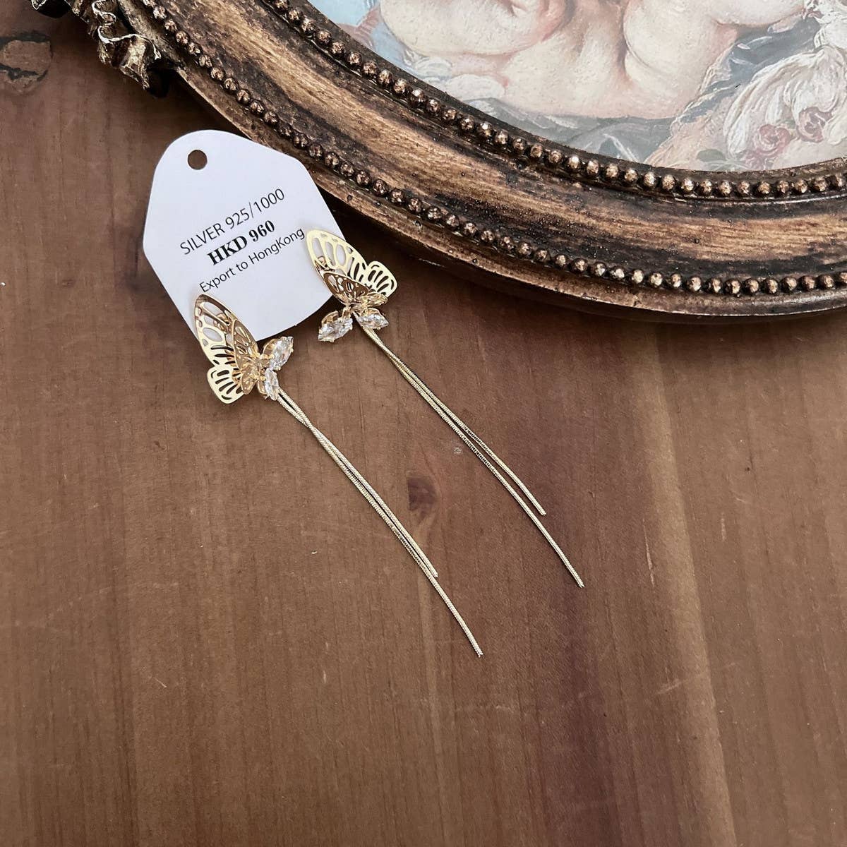 HOLLOW BUTTERFLY TASSEL EARRINGS