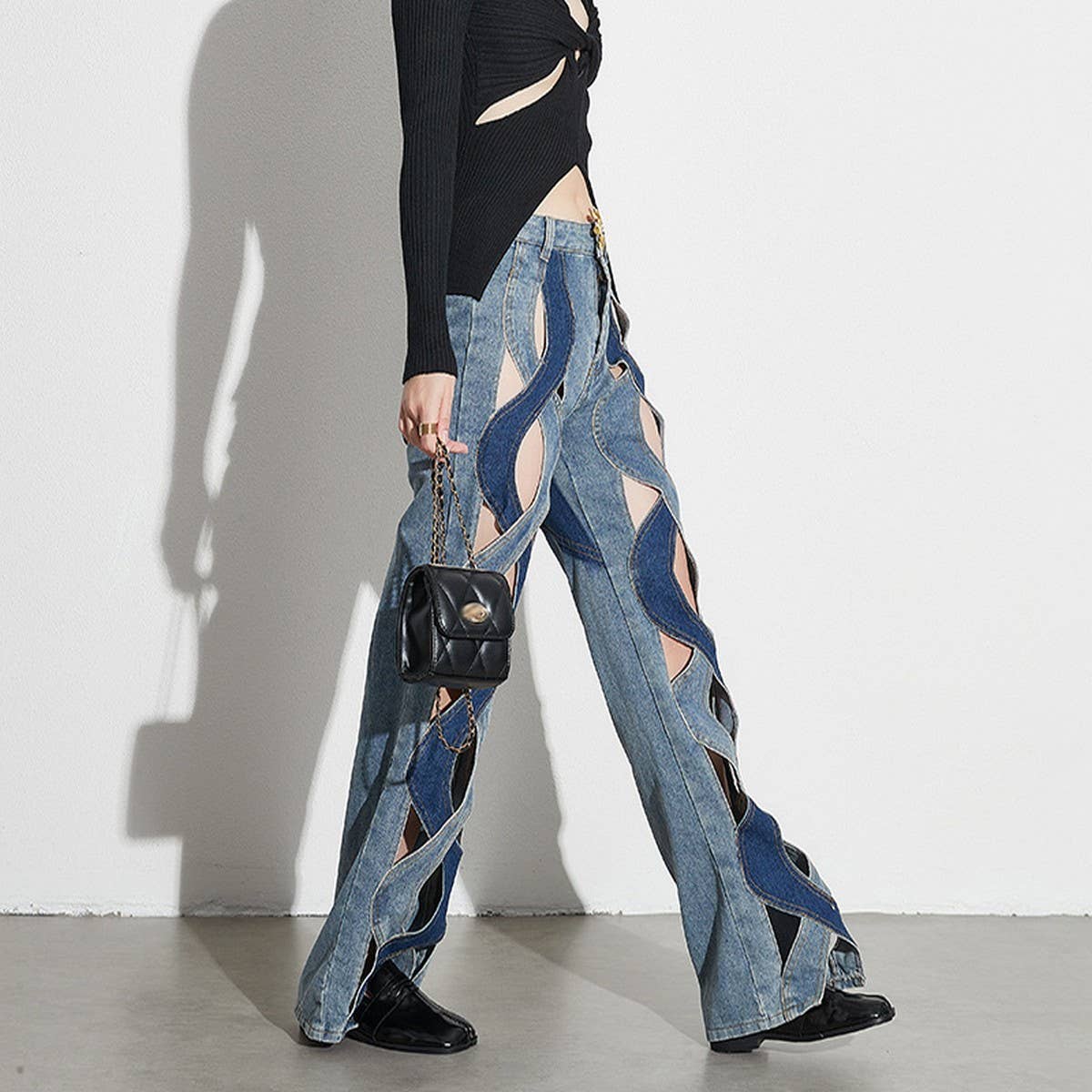 SPLICED CONTRASTING HOLLOW OUT JEANS_CWJP0189